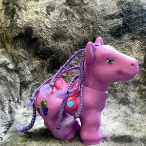 Vintage Little Pony Large Sized Purple W/ pink saddle 12"